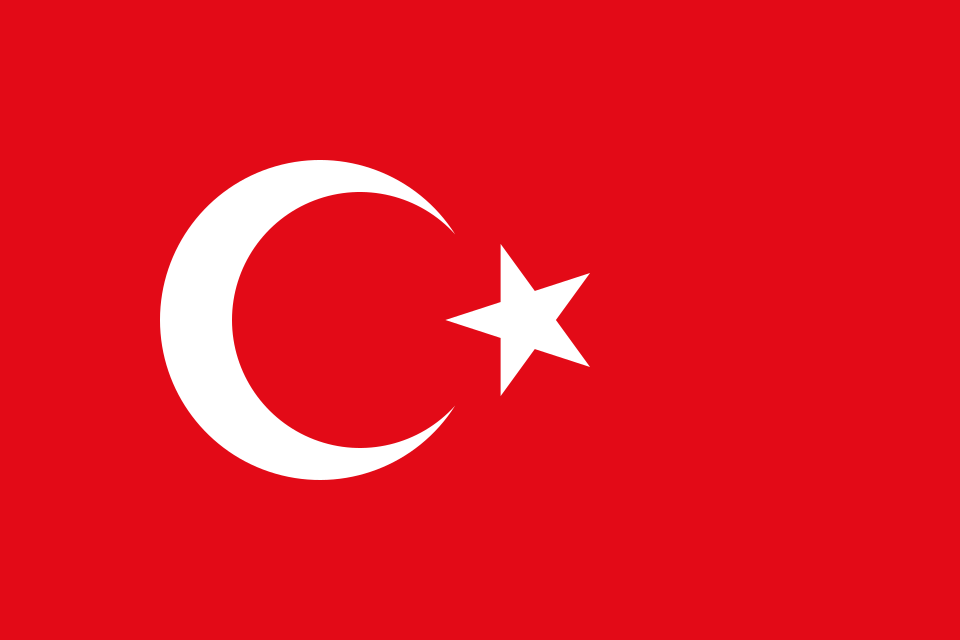 Drapeau rouge portant un croissant de lune blanc et une étoile blanche à cinq branches