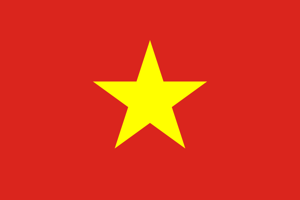 Drapeau rouge portant une grande étoile jaune à cinq branches au centre