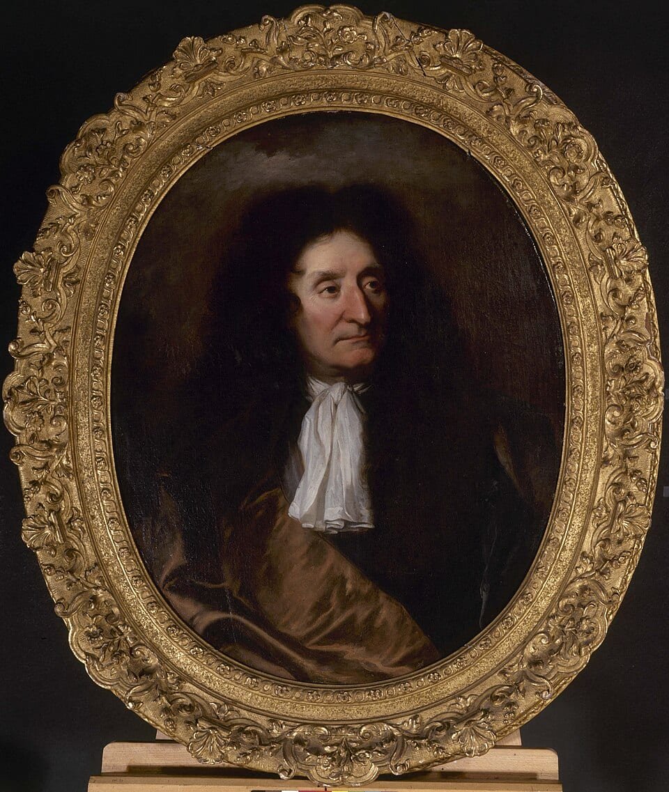 Portrait peint dans un cadre ovale doré, homme à la chevelure sombre