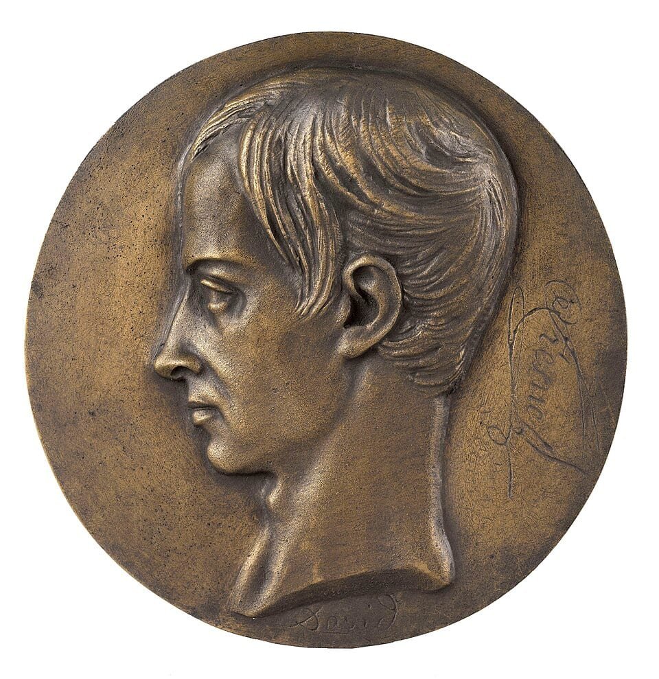 Médaillon en bronze montrant un jeune homme de profil